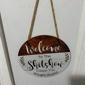 Rustic Welcome Sign with Humorous Message